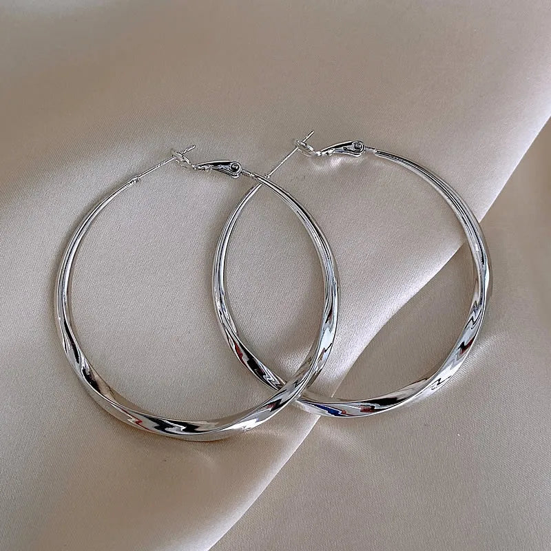 Mobius Twist Gold Hoop Earrings – Classic 50mm Statement Hoops for Women